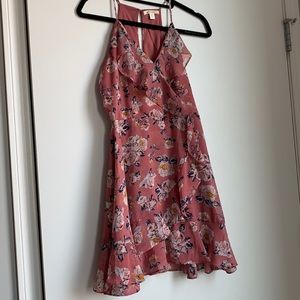 Blush + floral faux wrap dress with ruffle detail
